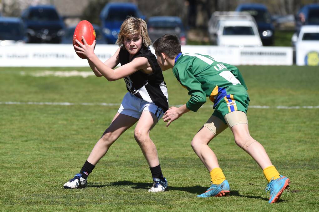 BFL under-14 reserves: Lachlan Oakley (Darley) and Ethan Forbes (Lake Wendouree). Picture: Kate Healy