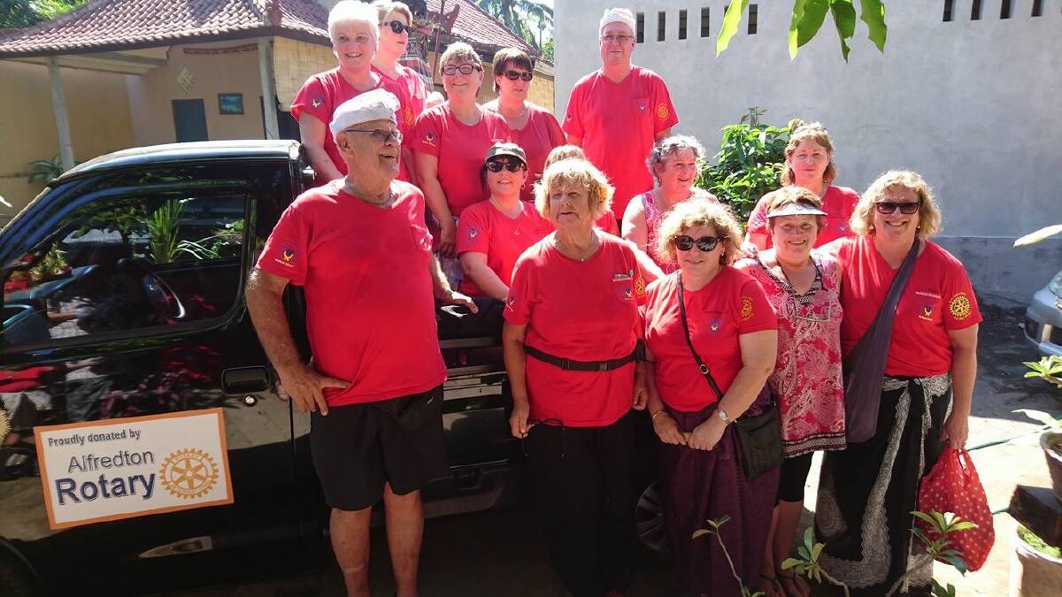 Alfredton members with the ute they donated to ferry patients and medical supplies about the district.