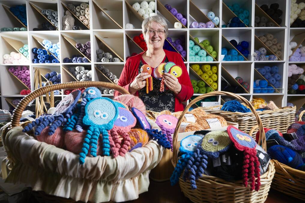 Wendy Abraham with knitted octopuses for premature babies. Picture: Luka Kauzlaric