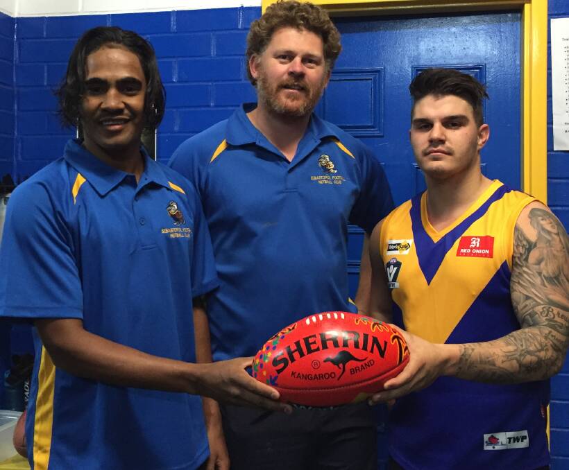 PROUD: Burras head coach Shane Snibson with Daniel Cox, who moved from Western Australia to pursue his football dream, and Adrian Broughton ahead of Ballarat Football League's Indigenous Round. Picture: Melanie Whelan