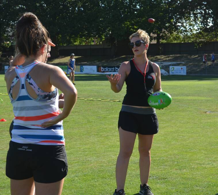 EMPHASIS: Lake Wendouree playing-coach Melinda Sands, who also instructs AFL Active sessions, says it is vital for women to learn the right, safest techniques from the outset. Picture: VicHealth