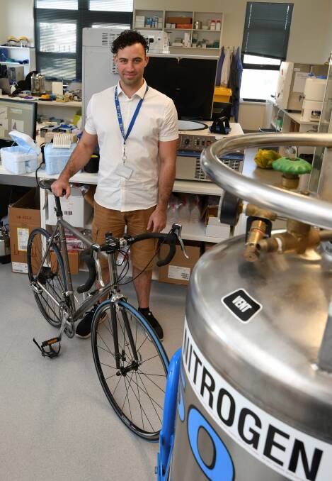 MISSION: Cycling scientist Tobias Meredith beat Non-Hodgkin Lymphoma and now fights cancer for others in the lab and on his bike. Picture: Lachlan Bence