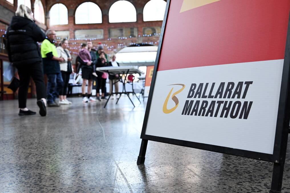 Participants line up early for Ballarat Marathon festival's bib collection in The Mining Exchange on Friday April 26, 2024. Picture by Kate Healy