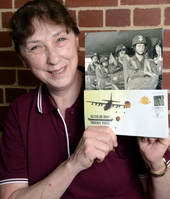 STUCK: Ballarat Health Services nurse Julie Grose's days as a parachute rigger have been captured in an Australia Post commemorative stamp. Ms Grose is the first female parachute rigger in Australia. Picture: Kate Healy