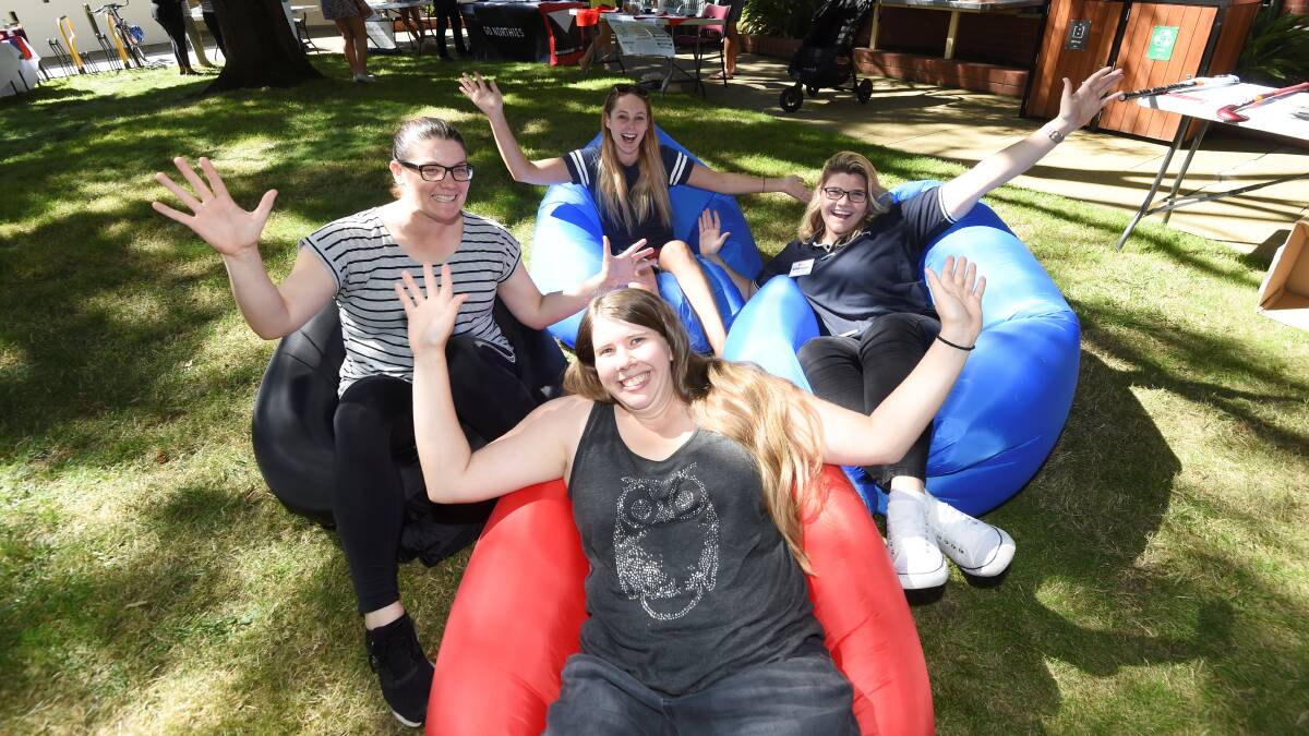 COMMUNITY: ACU students Elena Sewell-Dolphin, Kate Gladwell, Kellie Dugan and Elise Ashfield enjoy Aquinas campus market day. Picture: Lachlan Bence
