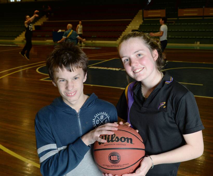 COMMON GROUND: Ballarat Specialist School's Thomas Wallman and Phoenix College's Tahlia Pring enjoy talking hoops in Basketball Victoria's JUMP program each week this term. Picture: Kate Healy