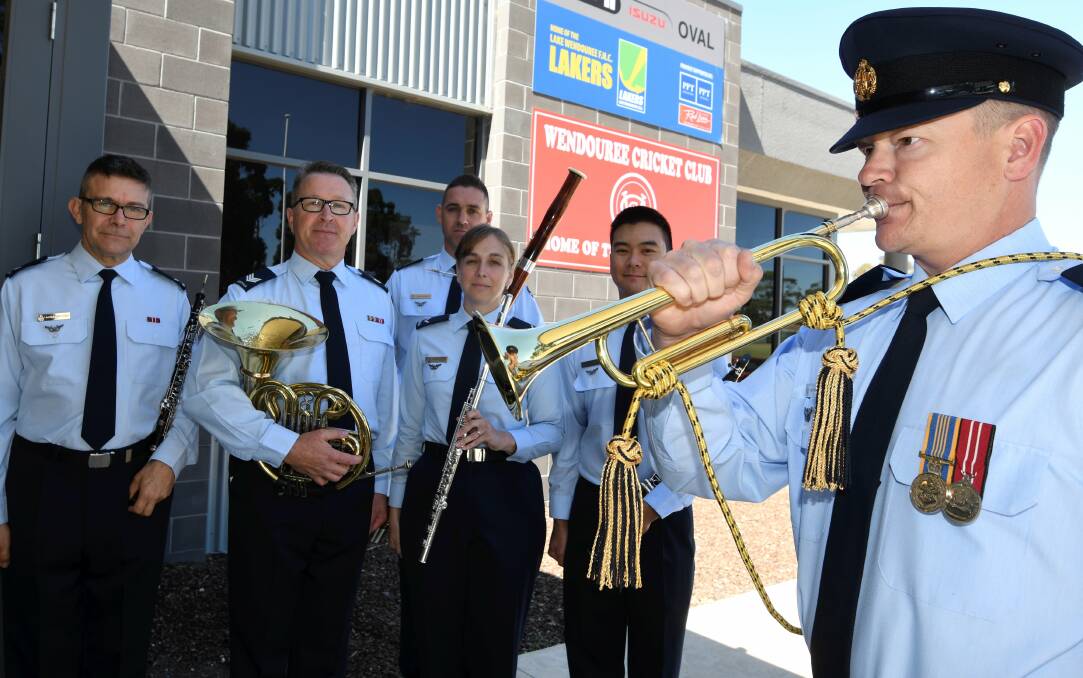 FLY-IN: Air Force Band members Salvador Blasco, Ian Hodgson, Adam Schlemitz, Emma Knight, Nathan Low form a quintet to team with Brenton Burley in a special lunchtime performance in Ballarat. Picture: Lachlan Bence