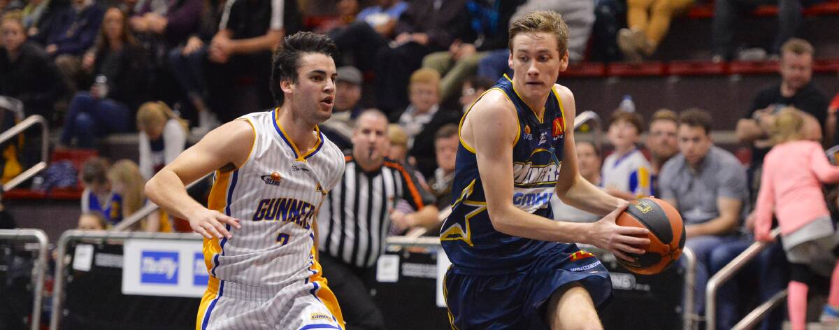 EXPOSURE: Miner Sam Short can learn and absorb all the one per centers from players like Chris Goulding while training with Melbourne United. Picture: Dylan Burns