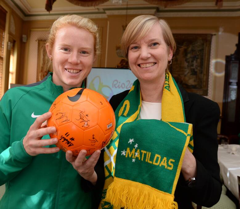 RIO READY: Matildas' co-captain Clare Polkinghorne meets Matildas fan and Victorian Minister for Women Fiona Richardson to talk gender equality in sport at Craig's Royal Hotel on Tuesday. Picture: Kate Healy