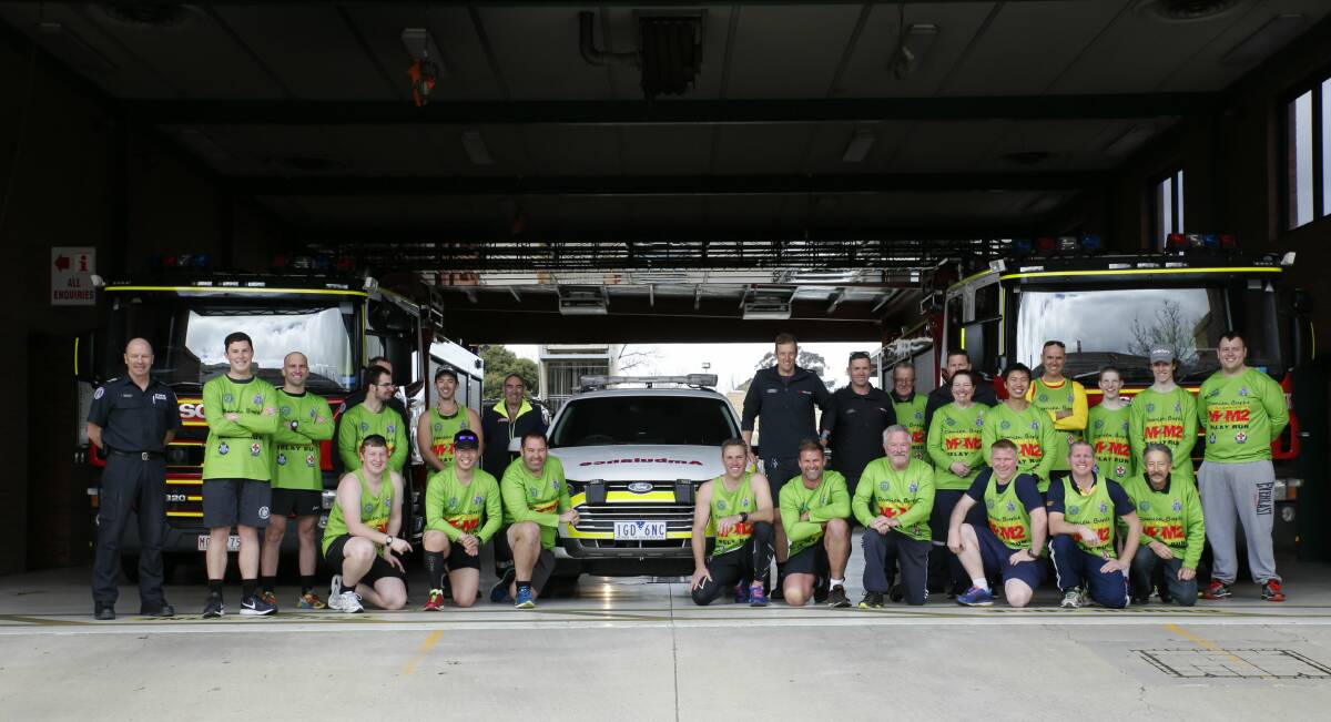 SUPPORT: Emergency service workers take a breath at Bendigo Fire Station in the 600-kilometre Damien Burke Memorial Relay Run, which arrives in Ballarat on Thursday. Picture: Bendigo Advertiser