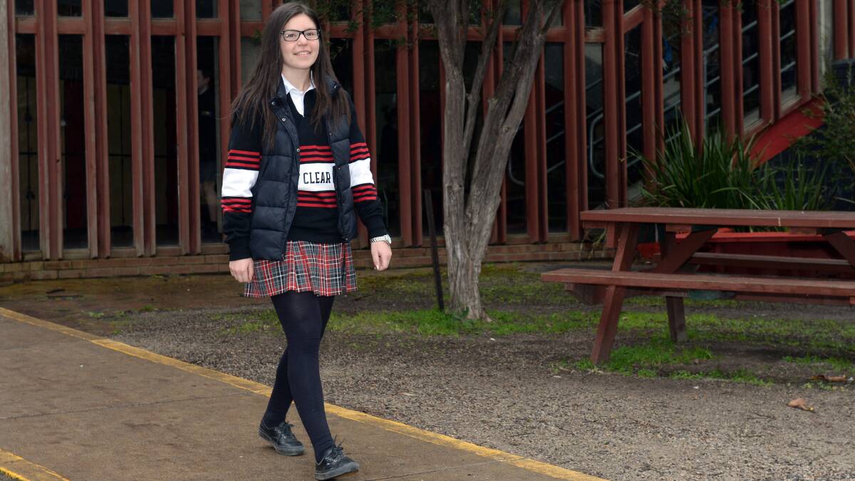 COURAGE: Emma Milesevic is tackling recovery from spinal surgery in upbeat, determined fashion to get through year 12 and back on the track. Picture: Kate Healy