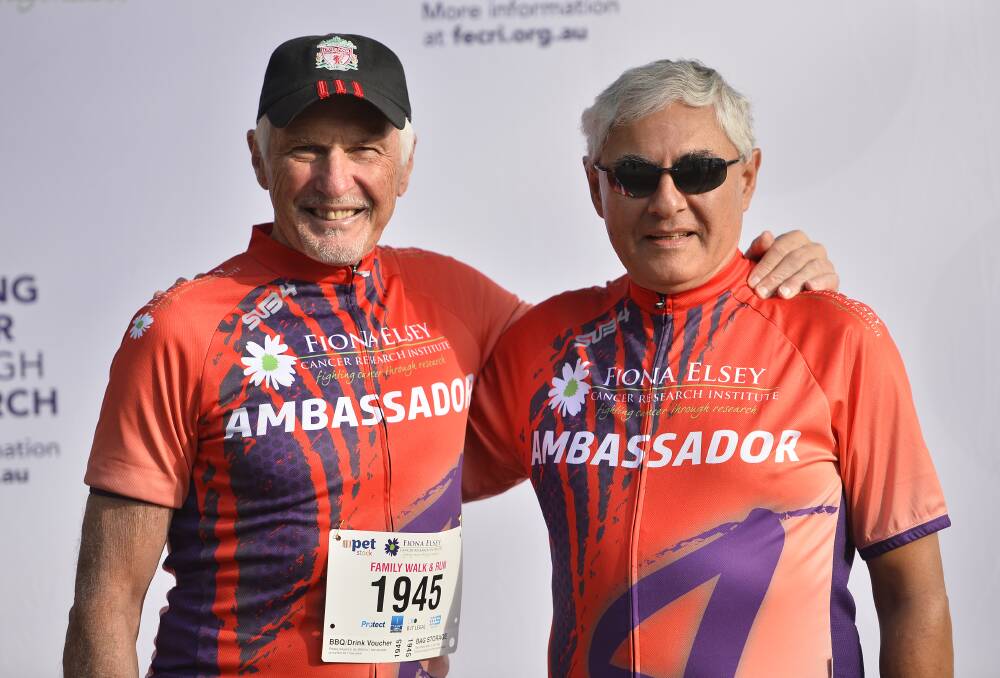 TEAM APPROACH: Reach4Research Cycle Classic ambassador Michael Malthouse and Fiona Elsey Cancer Research Institute honourary director George Kannourakis. Picture: Dylan Burns