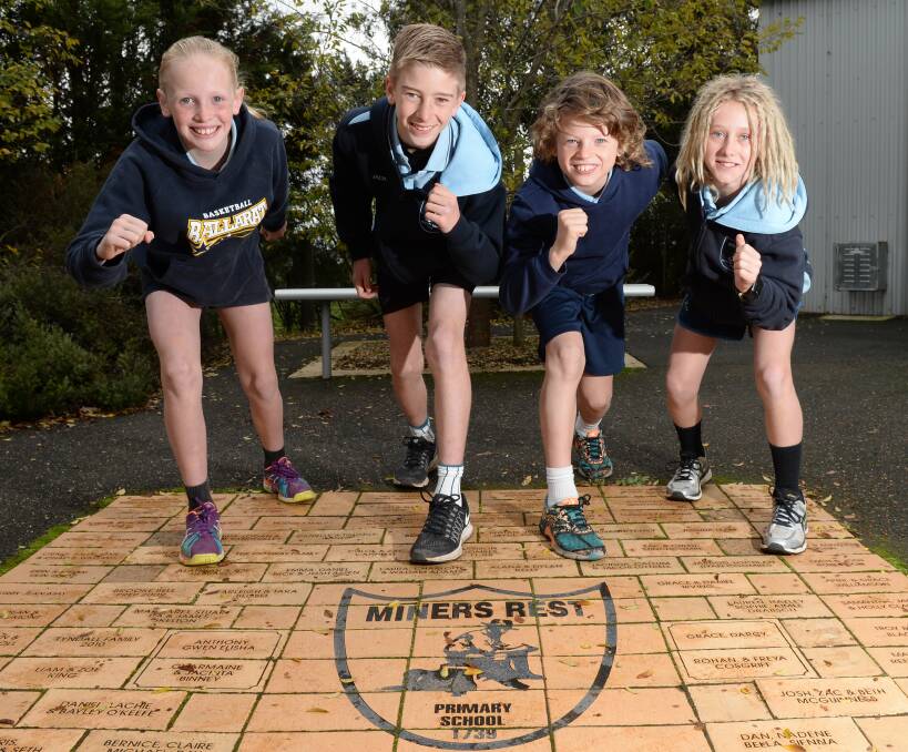 RESULT: Miners Rest will sport Sarah (age 10), Jack (12), Archie (10), and Jude (11) at state cross country, which principal Dale Power says is a great product of the school's running culture. Picture: Kate Healy
