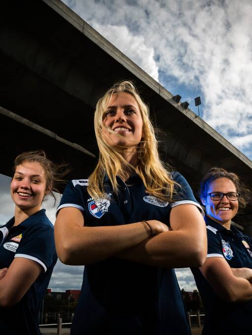 PIONEERS: Western Bulldogs Ellie Blackburn, Kaitlyn Ashmore and Emma Kearney ahead of the AFL women's all-stars game. Picture: Chris Hopkins, The Age