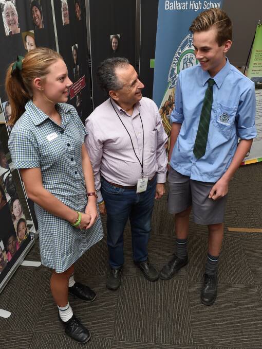 CARE: Ballarat High's Ellena Raven and Keith Scott listen in close to Peter Gaspar's message of tolerance, acceptance and love. Picture: Lachlan Bence