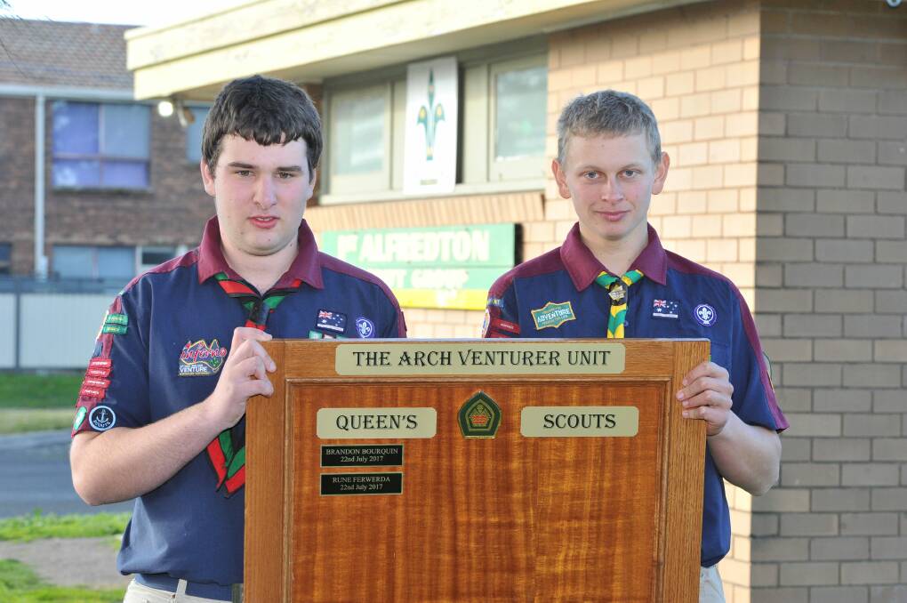 TOP HONOURS: Arch Venturers Rune Ferwerda and Brandon Bourquin proudly receive the Queens Scout Award in a ceremony on Saturday afternoon. Picture: Lachlan Bence