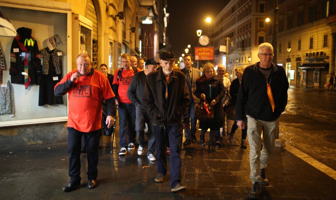 PUSHING FOR CHANGE: Ballarat sexual abuse survivors Tony Wardley, Paul Auchettl, Phil Nagle and others en route to Vatican-based Cardinal George Pell's testimony to a child sex abuse inquiry in Rome. Picture: Marco Di Lauro