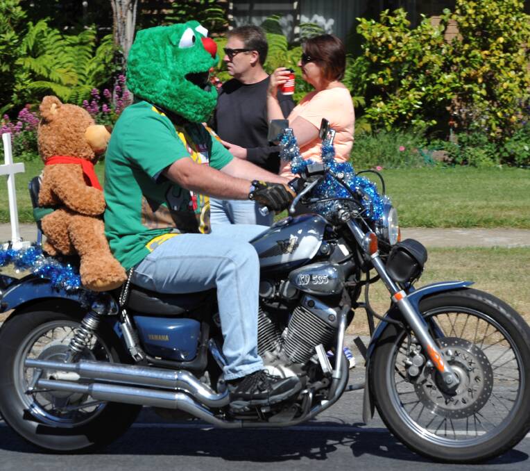 FESTIVE: Two furry friends hit the road for the annual toy run fun, leaving Buninyong on Saturday. Picture: Lachlan Bence