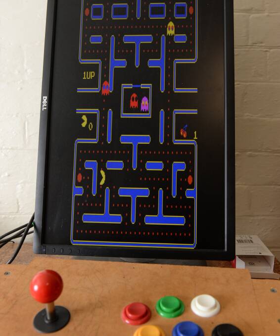 QUICK DEMO: The hackers whipped this pac-man arcade game up in a couple of hours for an open-house. Picture: Kate Healy