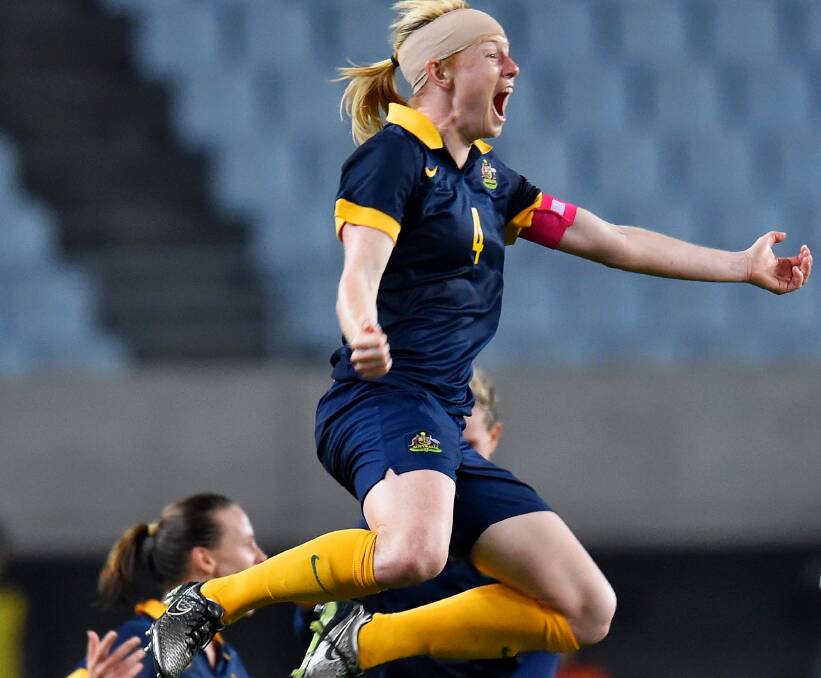 FIRED UP: Matildas co-captain Claire Polkinghorne celebrates the exact moment the Matildas qualify for their first Olympics since 2004. Ballarat is an important preparation step for Rio. Picture: Getty Images