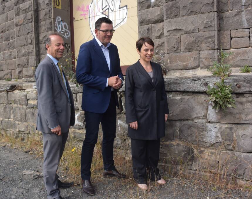 Parking focus: Premier Daniel Andrews (centre) with Regional Development Minister Jaala Pulford and Buninyong MP Geoff Howard. 