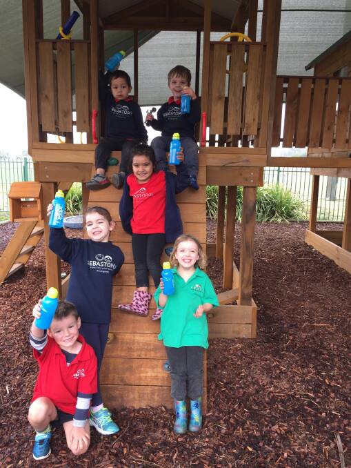 HYDRATED: Sebastopol Early Education kindergarten children (from top) Dominic, Oliver, Alilia, Charlotte, Poppy and Payton happily quench their playground thirst with tap water.