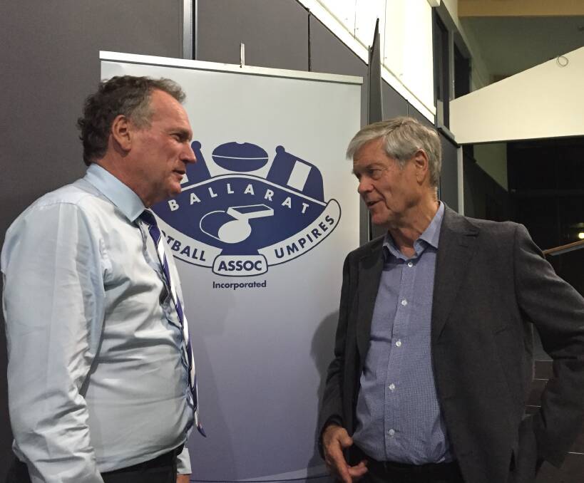 EXPERT OPINION: Legendary AFL figure David Parkin catches up with Ballarat Football Umpires Association chairman Richard Carroll after delivering a pre-season address to umpires at St Patrick's College pavilion this week.