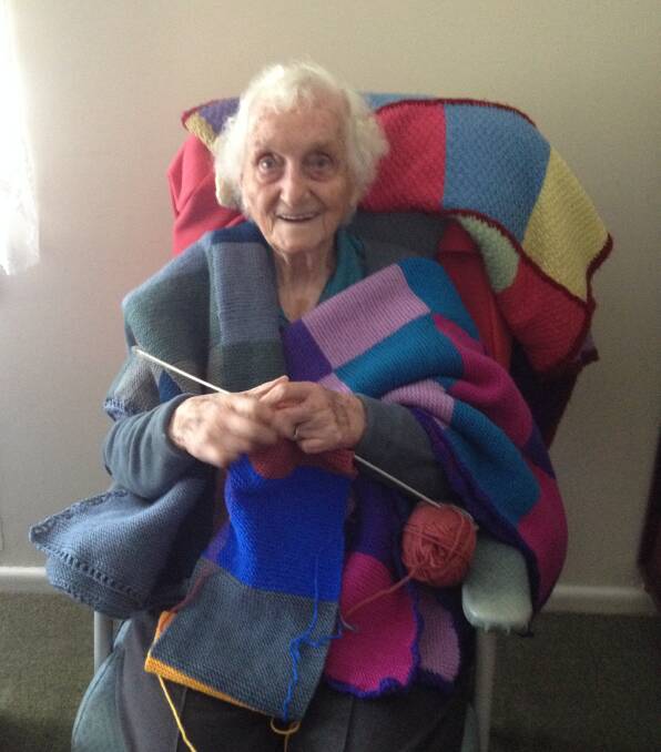 MADE WITH LOVE: Ninety-eight-year-old Amy Burow knits daily to maintain hand dexterity, creating blankets for charity.