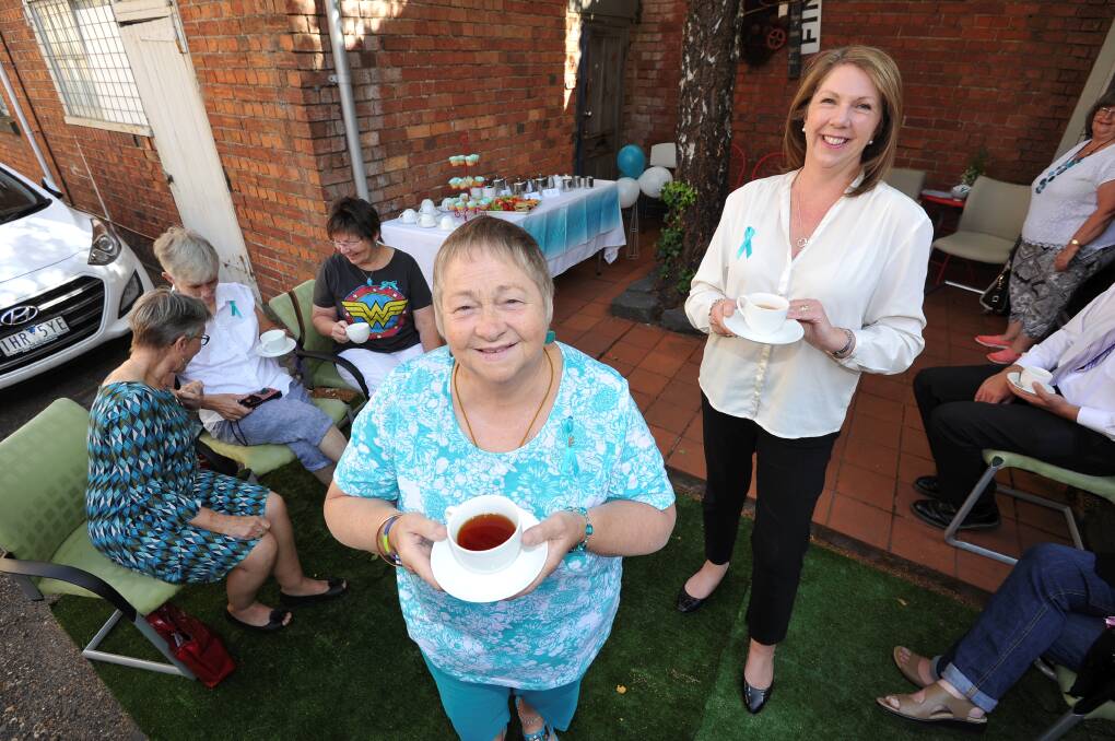 UP FOR A CHAT: Long-time teal advocates Dot Cherry and Ballarat MP Catherine King urge women to talk in a morning or afternoon teal today, Teal Ribbon Day. 