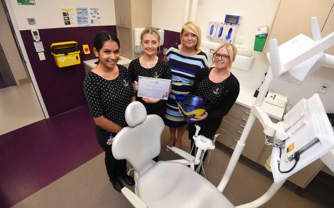 HONOURS: BHS dental's Shianne Milera, Hannah Quinlan, Jacqui Nolan and Siobhan Shannon celebrate a team effort. Picture: Lachlan Bence