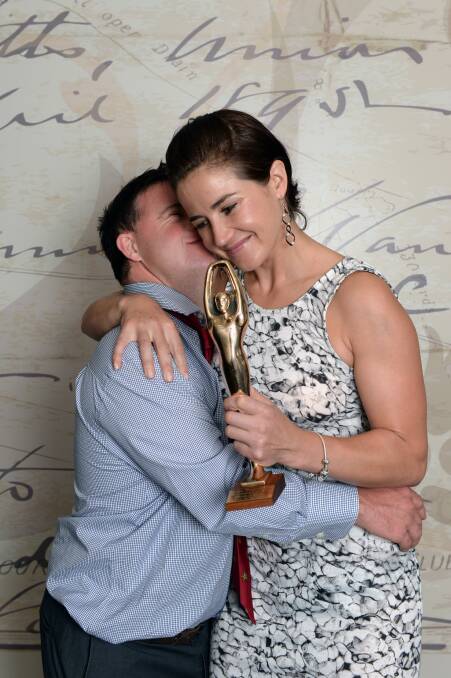Melbourne Cup winning jockey Michelle Payne is congratulated as Ballarat Sportsperson of the Year in 2015 by her brother Stevie Payne. Picture by Kate Healy