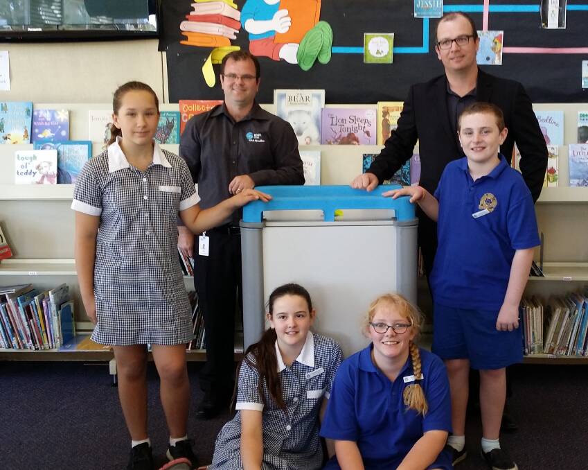 IN DOCK: Sebastopol Primary School has a new base to store iPads thanks to BDNH business service officer Will Neville and BDNH people and quality manager Kris Payne who delivered the port to school leaders Larah Krecmanis (vice-captain), BJ Filcock (vice-captain). FRONT- School captains Anastastia Montgomery and Montanna Bailey. 