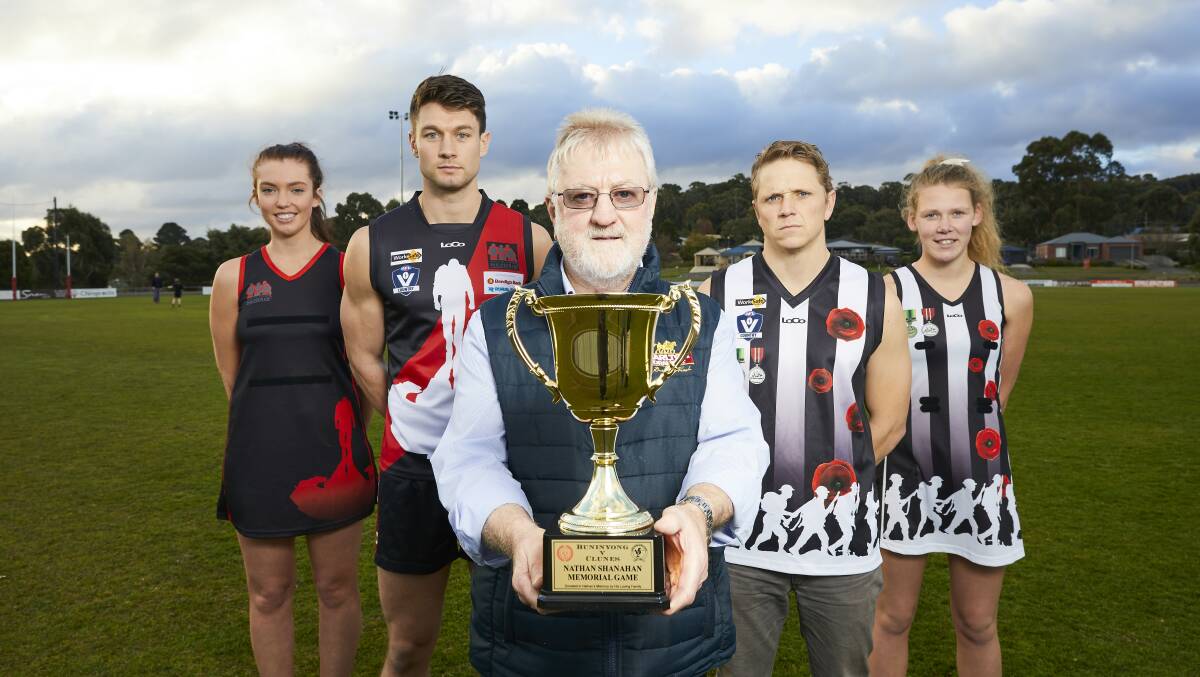 AWARENESS: Buninyong's Zoe Ottavi, Jake Dunne and coach Jarrod Morgan (showing support in a Clunes guernsey) and Clunes' Montanna Mair with John Shanahan to promote mental health. Picture: Luka Kauzlaric