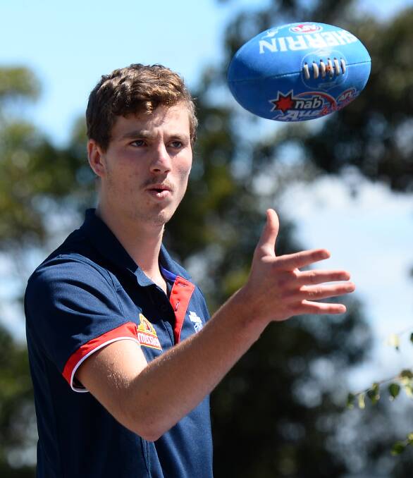 FOCUSED: Bulldog Zaine Cordy, pictured in a Ballarat community camp, grew up in Geelong and says another AFL stadium in regional Victoria will be great for youngsters to run on. 