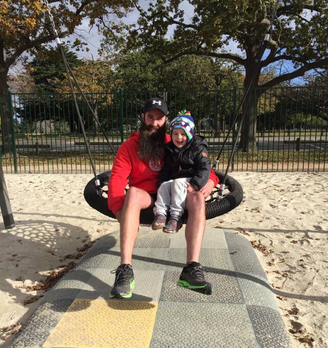 PLAYTIME: Four-year-old Dylan has fun on the swing - one of his favourites - with his bearded uncle Aaron Thompson in the Victoria Park inclusive playspace.