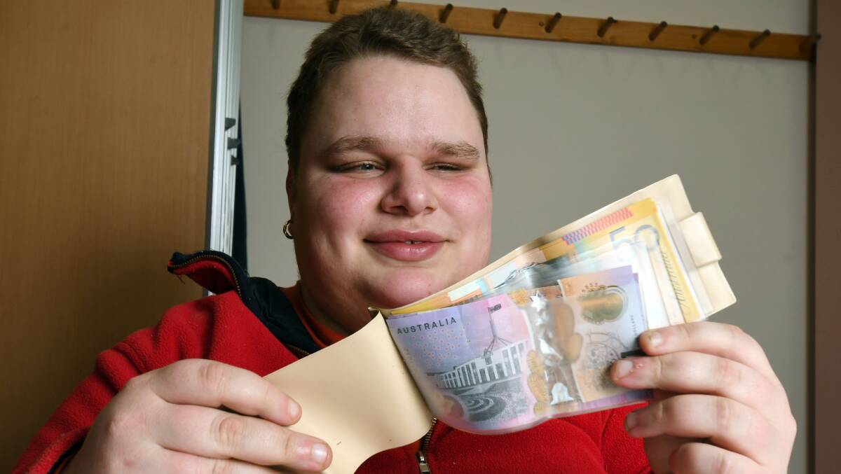 Ash Finn, who is blind, is concerned that changes brought out in new bank notes will make denominations harder to distinguish. Picture: Kate Healy