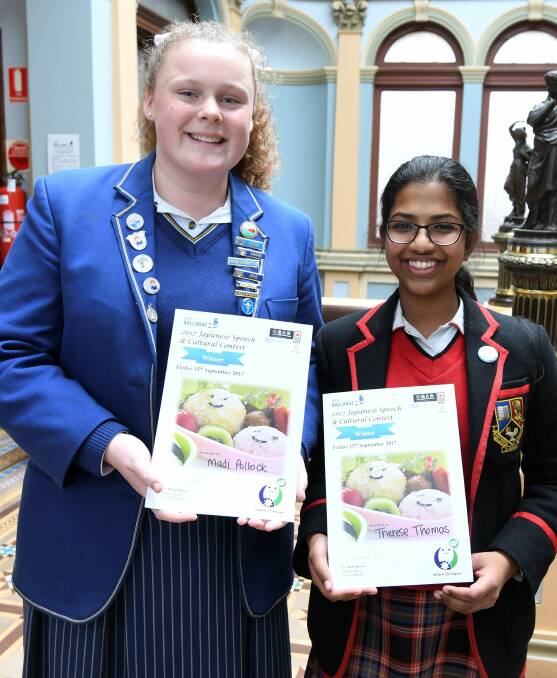 Winning smiles: Madi Pollock and Therese Thomas were winners of the Japan Speech and Cultural Contest, which will see them travel to Ballarat's sister city Inagawa for a two week visit in late November. Picture: Lachlan Bence