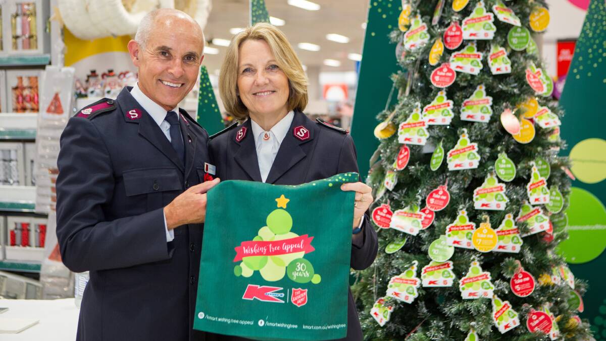 Joy: The Salvation Army's Major Peter Ellis and Corporal Karyn Rigley launch the annual Wishing Tree Appeal. The drive collected more than 380,000 presents in 2016.