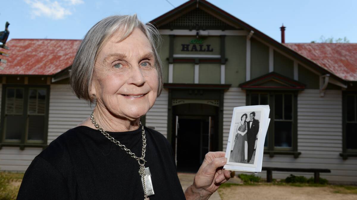 Memories: Elaine Moodie shows a photo of herself winning belle of the ball at Learmonth's Art Hall. For the 150th anniversary of the building, the Art Hall is hosting an afternoon tea on October 28. Photo: Kate Healy 