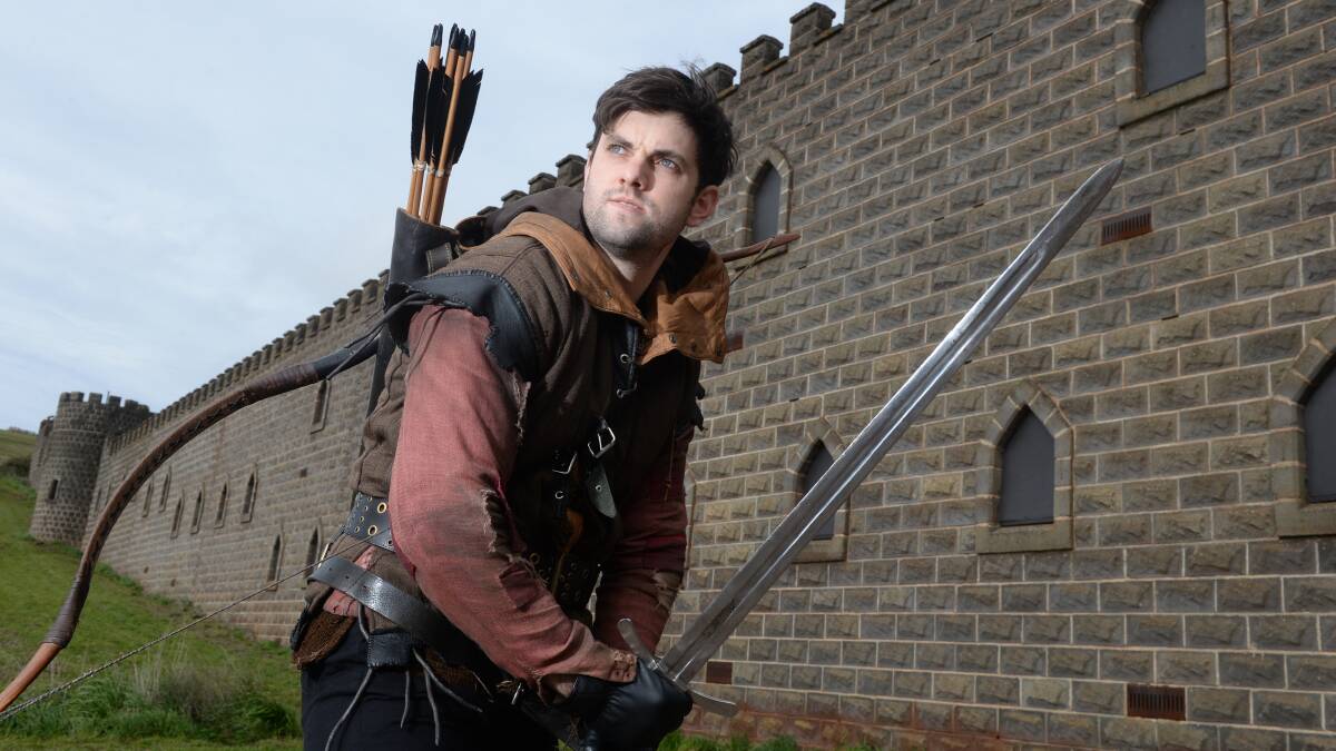 SIEGE: Paul Allica stars as skilled archer Robin Hood and is producing new medieval action movie The Siege, currently shooting at Kryal Castle. Picture: Kate Healy