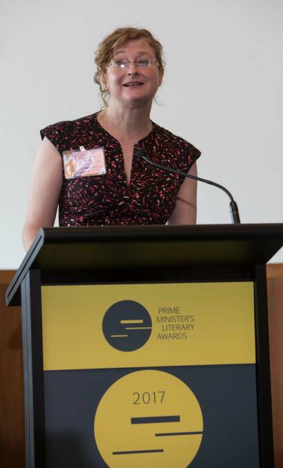 Big win: Local author Cath Crowley accepting the $80,000 Prime Minister’s Literary Award for Young Adult Fiction for her 2017 novel Words in Deep Blue. 