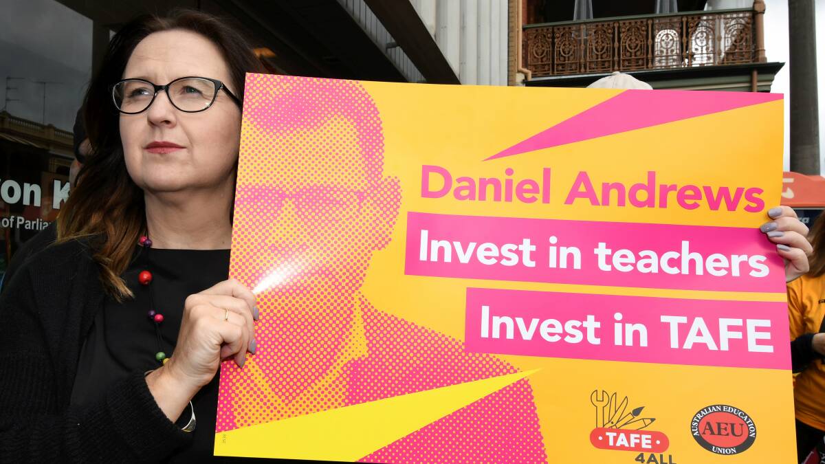 Stress: Federation University TAFE teacher Katrina Kavanagh at a protest outside MP Sharon Knight's office. AEU Victoria is calling on the state government to reconsider the proposed EBA. Picture: Lachlan Bence