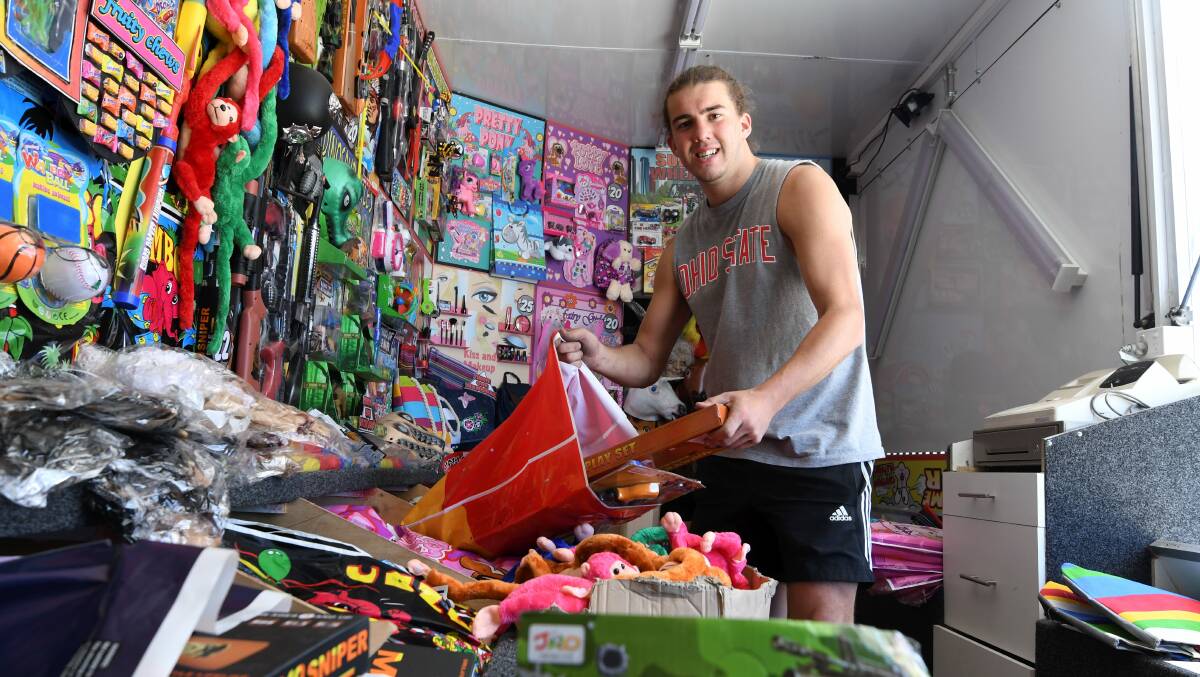 Ready, steady, show: Nathan Thornbury prepares to sell more than 9000 Bertie Beetle showbags this year. Picture: Lachlan Bence