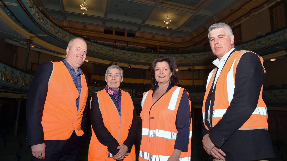 Construction site: CEO Royal South Street Society CEO Brett Macdonald, Commitee for Ballarat chair Janet Dore, Her Majesty's Theatre manager Daniel Henderson on the venue's stage. Picture: Kate Healy