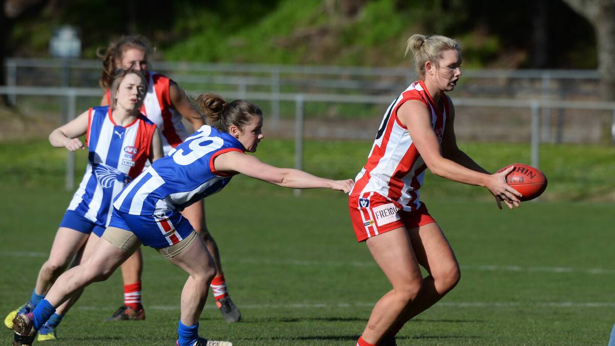 On the ball: AFL Goldfields women's division 1 - East Point Dragons v Ballarat Swans. Larissa Murphy (East Point) and Madison Davis (Ballarat). Picture: Kate Healy