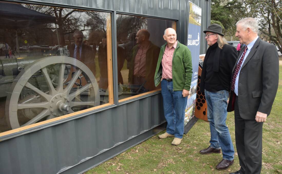 RESTORED: Barry Lyle from Miller Brothers, Barry Hore from Sovereign Hill and Cr John Philips at the unveiling of the German Howitzer. 