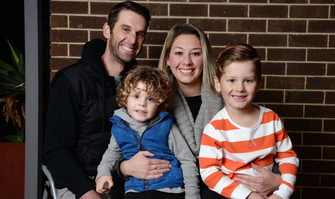 FAMILY TIES: Alfredton woman Sarah Martin with her husband Ashley and sons, Jake, 5, and Levi, 3. Ms Martin was recently diagnosed with a rare brain tumour. Picture: Kate Healy