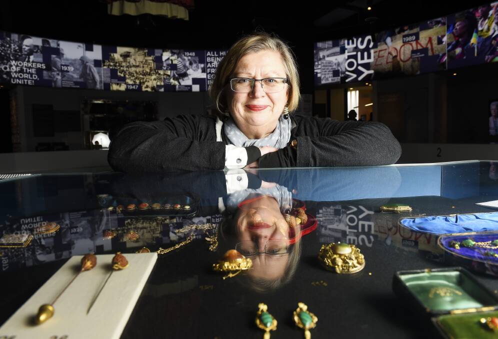 PRECIOUS: MADE director Jane Smith with a selection of pieces included in Bling – 19th century goldfields jewellery – exhibition. Picture: Luka Kauzlaric