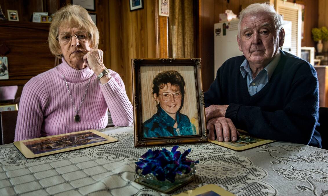HEARTBREAK: Spike and Ann Jones with a photograph of their beloved daughter Nina Nicholson, who was murdered at Clunes. Picture: Justin McManus