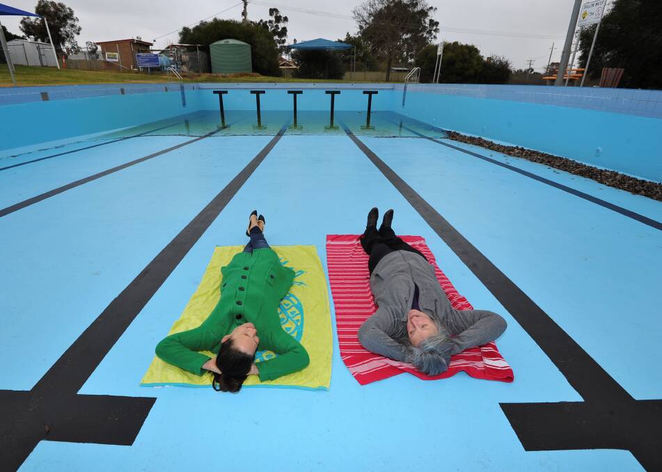 SPLASH: Early morning swimmers Angela Field and Joan Quinlan look forward to a warmer start to summer. Picture: Lachlan Bence